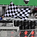 Marshals wave the chequered flag at Formula One World Championship, Rd20, Brazilian Grand Prix, Qualifying, Interlagos, Sao Paulo, Brazil, Saturday 12 November 2016. © Sutton Images