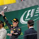 Max Verstappen (NED) Red Bull Racing celebrates on the podium with the trophy at Formula One World Championship, Rd20, Brazilian Grand Prix, Race, Interlagos, Sao Paulo, Brazil, Sunday 13 November 2016. © Sutton Images