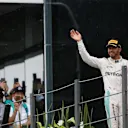 Lewis Hamilton (GBR) Mercedes AMG F1 celebrates on the podium at Formula One World Championship, Rd20, Brazilian Grand Prix, Race, Interlagos, Sao Paulo, Brazil, Sunday 13 November 2016. © Sutton Images