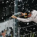 Nico Rosberg (GER) Mercedes AMG F1 celebrates with the champagne on the podium at Formula One World Championship, Rd20, Brazilian Grand Prix, Race, Interlagos, Sao Paulo, Brazil, Sunday 13 November 2016. © Sutton Images