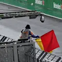 Marshal waves the Red Flag at Formula One World Championship, Rd20, Brazilian Grand Prix, Race, Interlagos, Sao Paulo, Brazil, Sunday 13 November 2016. © Sutton Images
