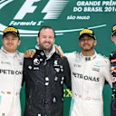 (L to R): Nico Rosberg (GER) Mercedes AMG F1, Bradley Lord (GBR) Mercedes AMG F1 Communication Manager, Lewis Hamilton (GBR) Mercedes AMG F1 and Max Verstappen (NED) Red Bull Racing celebrate on the podium at Formula One World Championship, Rd20, Brazilian Grand Prix, Race, Interlagos, Sao Paulo, Brazil, Sunday 13 November 2016. © Sutton Images