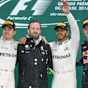 (L to R): Nico Rosberg (GER) Mercedes AMG F1, Bradley Lord (GBR) Mercedes AMG F1 Communication Manager, Lewis Hamilton (GBR) Mercedes AMG F1 and Max Verstappen (NED) Red Bull Racing celebrate on the podium at Formula One World Championship, Rd20, Brazilian Grand Prix, Race, Interlagos, Sao Paulo, Brazil, Sunday 13 November 2016. © Sutton Images