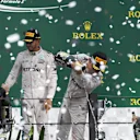 Bradley Lord (GBR) Mercedes AMG F1 Communication Manager, Lewis Hamilton (GBR) Mercedes AMG F1, Nico Rosberg (GER) Mercedes AMG F1 and Max Verstappen (NED) Red Bull Racing celebrate on the podium at Formula One World Championship, Rd20, Brazilian Grand Prix, Race, Interlagos, Sao Paulo, Brazil, Sunday 13 November 2016. © Sutton Images