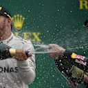 Lewis Hamilton (GBR) Mercedes AMG F1 and Max Verstappen (NED) Red Bull Racing celebrate on the podium with the champagne at Formula One World Championship, Rd20, Brazilian Grand Prix, Race, Interlagos, Sao Paulo, Brazil, Sunday 13 November 2016. © Sutton Images