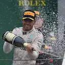 Lewis Hamilton (GBR) Mercedes AMG F1 and Max Verstappen (NED) Red Bull Racing celebrate on the podium with the champagne at Formula One World Championship, Rd20, Brazilian Grand Prix, Race, Interlagos, Sao Paulo, Brazil, Sunday 13 November 2016. © Sutton Images