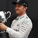 Nico Rosberg (GER) Mercedes AMG F1 celebrates on the podium with the trophy at Formula One World Championship, Rd20, Brazilian Grand Prix, Race, Interlagos, Sao Paulo, Brazil, Sunday 13 November 2016. © Sutton Images
