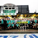 Lewis Hamilton (GBR) Mercedes AMG F1 and Nico Rosberg (GER) Mercedes AMG F1 celebrate with the team at Formula One World Championship, Rd20, Brazilian Grand Prix, Race, Interlagos, Sao Paulo, Brazil, Sunday 13 November 2016. © Sutton Images