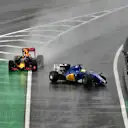 Marcus Ericsson (SWE) Sauber C35 crashes and is passed by Max Verstappen (NED) Red Bull Racing RB12 in pit lane entrance at Formula One World Championship, Rd20, Brazilian Grand Prix, Race, Interlagos, Sao Paulo, Brazil, Sunday 13 November 2016. © Sutton Images