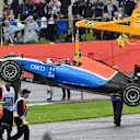 The retired car of Pascal Wehrlein (GER) Manor Racing MRT05 is recovered by Marshals at Formula One World Championship, Rd10, British Grand Prix, Race, Silverstone, England, Sunday 10 July 2016. © Sutton Images