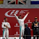 John Owen (GBR) Mercedes AMG F1 Chief Designer, Nico Rosberg (GER) Mercedes AMG F1, Race winner Lewis Hamilton (GBR) Mercedes AMG F1 and Max Verstappen (NED) Red Bull Racing celebrate on the podium with the trophy at Formula One World Championship, Rd10, British Grand Prix, Race, Silverstone, England, Sunday 10 July 2016. © Sutton Images