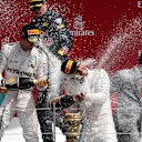 Nico Rosberg (GER) Mercedes AMG F1, Race winner Lewis Hamilton (GBR) Mercedes AMG F1 and Max Verstappen (NED) Red Bull Racing celebrate on the podium with the champagne at Formula One World Championship, Rd10, British Grand Prix, Race, Silverstone, England, Sunday 10 July 2016. © Sutton Images