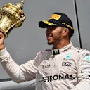 Race winner Lewis Hamilton (GBR) Mercedes AMG F1 celebrates with the trophy at Formula One World Championship, Rd10, British Grand Prix, Race, Silverstone, England, Sunday 10 July 2016. © Sutton Images