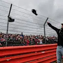 Lewis Hamilton (GBR) Mercedes AMG F1 throws caps to the fans on the drivers parade at Formula One World Championship, Rd10, British Grand Prix, Race, Silverstone, England, Sunday 10 July 2016. © Sutton Images