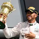 Race winner Lewis Hamilton (GBR) Mercedes AMG F1 celebrates on the podium with the trophy at Formula One World Championship, Rd10, British Grand Prix, Race, Silverstone, England, Sunday 10 July 2016. © Sutton Images