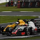 Kevin Magnussen (DEN) Renault Sport F1 Team RS16 and Esteban Gutierrez (MEX) Haas VF-16 battle at Formula One World Championship, Rd10, British Grand Prix, Race, Silverstone, England, Sunday 10 July 2016. © Sutton Images