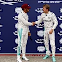 Pole sitter Lewis Hamilton (GBR) Mercedes AMG F1 and Nico Rosberg (GER) Mercedes AMG F1 celebrate in parc ferme at Formula One World Championship, Rd7, Canadian Grand Prix, Qualifying, Montreal, Canada, Saturday 11 June 2016. © Sutton Images