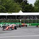 Sebastian Vettel (GER) Ferrari SF16-H leads at the start of the race at Formula One World Championship, Rd7, Canadian Grand Prix, Race, Montreal, Canada, Sunday 12 June 2016. © Sutton Images