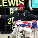Race winner Lewis Hamilton (GBR) Mercedes AMG F1 celebrates with the team and the trophies at Formula One World Championship, Rd7, Canadian Grand Prix, Race, Montreal, Canada, Sunday 12 June 2016. © Sutton Images