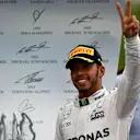 Race winner Lewis Hamilton (GBR) Mercedes AMG F1 celebrates on the podium at Formula One World Championship, Rd7, Canadian Grand Prix, Race, Montreal, Canada, Sunday 12 June 2016. © Sutton Images