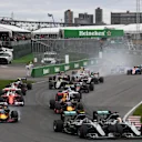 Nico Rosberg (GER) Mercedes-Benz F1 W07 Hybrid and Lewis Hamilton (GBR) Mercedes-Benz F1 W07 Hybrid battle at the start of the race at Formula One World Championship, Rd7, Canadian Grand Prix, Race, Montreal, Canada, Sunday 12 June 2016. © Sutton Images