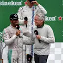 Race winner Lewis Hamilton (GBR) Mercedes AMG F1 on the podium with Michael Douglas (USA) at Formula One World Championship, Rd7, Canadian Grand Prix, Race, Montreal, Canada, Sunday 12 June 2016. © Sutton Images