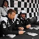 Jenson Button (GBR) McLaren and Fernando Alonso (ESP) McLaren at the autograph session at Formula One World Championship, Rd7, Canadian Grand Prix, Preparations, Montreal, Canada, Thursday 9 June 2016. © Sutton Images
