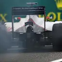 Esteban Gutierrez (MEX) Haas VF-16 with his rear brakes on fire at Formula One World Championship, Rd3, Chinese Grand Prix, Practice, Shanghai, China, Friday 15 April 2016. © Sutton Motorsport Images