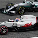 Romain Grosjean (FRA) Haas VF-16 and Nico Rosberg (GER) Mercedes-Benz F1 W07 Hybrid battle at Formula One World Championship, Rd3, Chinese Grand Prix, Practice, Shanghai, China, Friday 15 April 2016. © Sutton Motorsport Images