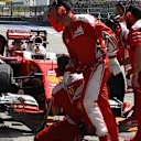 Sebastian Vettel (GER) Ferrari SF16-H pit stop at Formula One World Championship, Rd3, Chinese Grand Prix, Practice, Shanghai, China, Friday 15 April 2016. © Sutton Motorsport Images