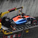 The crashed car of Pascal Wehrlein (GER) Manor Racing MRT05 is recovered in Q1 at Formula One World Championship, Rd3, Chinese Grand Prix, Qualifying, Shanghai, China, Saturday 16 April 2016. © Sutton Motorsport Images