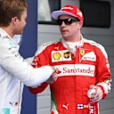 Pole sitter Nico Rosberg (GER) Mercedes AMG F1 and Kimi Raikkonen (FIN) Ferrari celebrate in parc ferme at Formula One World Championship, Rd3, Chinese Grand Prix, Qualifying, Shanghai, China, Saturday 16 April 2016. © Sutton Motorsport Images