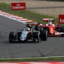Sergio Perez (MEX) Force India VJM09 and Kimi Raikkonen (FIN) Ferrari SF16-H at Formula One World Championship, Rd3, Chinese Grand Prix, Race, Shanghai, China, Sunday 17 April 2016. © Sutton Motorsport Images