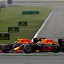 Daniel Ricciardo (AUS) Red Bull Racing RB12 with rear puncture and Daniil Kvyat (RUS) Red Bull Racing RB12 at Formula One World Championship, Rd3, Chinese Grand Prix, Race, Shanghai, China, Sunday 17 April 2016. © Sutton Motorsport Images