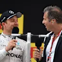 Race winner Nico Rosberg (GER) Mercedes AMG F1 and Kai Ebel (GER) RTL Presenter on the podium at Formula One World Championship, Rd3, Chinese Grand Prix, Race, Shanghai, China, Sunday 17 April 2016. © Sutton Motorsport Images