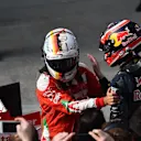 Sebastian Vettel (GER) Ferrari celebrates in parc ferme with Daniil Kvyat (RUS) Red Bull Racing at Formula One World Championship, Rd3, Chinese Grand Prix, Race, Shanghai, China, Sunday 17 April 2016. © Sutton Motorsport Images