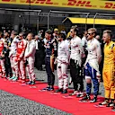 Drivers observe the Natioanal Anthem on the grid at Formula One World Championship, Rd3, Chinese Grand Prix, Race, Shanghai, China, Sunday 17 April 2016. © Sutton Motorsport Images
