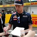 Daniil Kyvat (RUS) Red Bull Racing signs autographs for the fans at Formula One World Championship, Rd3, Chinese Grand Prix, Preparations, Shanghai, China, Thursday 14 April 2016. © Sutton Motorsport Images