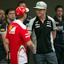 Nico Hulkenberg (GER) Force India F1 and Sebastian Vettel (GER) Ferrari at Formula One World Championship, Rd3, Chinese Grand Prix, Preparations, Shanghai, China, Thursday 14 April 2016. © Sutton Motorsport Images