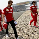 Sebastian Vettel (GER) Ferrari walks the track with Riccardo Adami (ITA) Ferrari Race Engineer  and Jock Clear (GBR) Ferrari Chief Engineer at Formula One World Championship, Rd3, Chinese Grand Prix, Preparations, Shanghai, China, Thursday 14 April 2016.
 © Sutton Motorsport Images
