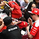 Kimi Raikkonen (FIN) Ferrari signs autographs for the fans at Formula One World Championship, Rd3, Chinese Grand Prix, Preparations, Shanghai, China, Thursday 14 April 2016. © Sutton Motorsport Images