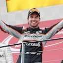 Sergio Perez (MEX) Force India celebrates on the podium with the trophy at Formula One World Championship, Rd8, European Grand Prix, Race, Baku City Circuit, Baku, Azerbaijan, Sunday 19 June 2016. © Sutton Images