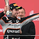 Sergio Perez (MEX) Force India celebrates on the podium with the trophy at Formula One World Championship, Rd8, European Grand Prix, Race, Baku City Circuit, Baku, Azerbaijan, Sunday 19 June 2016. © Sutton Images