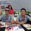 Pascal Wehrlein (GER) Manor Racing and Rio Haryanto (IDN) Manor Racing at the autograph session at Formula One World Championship, Rd8, European Grand Prix, Race, Baku City Circuit, Baku, Azerbaijan, Sunday 19 June 2016. © Sutton Images
