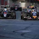 Fernando Alonso (ESP) McLaren MP4-31 and Carlos Sainz jr (ESP) Scuderia Toro Rosso STR11 battle for position at the start of the race at Formula One World Championship, Rd8, European Grand Prix, Race, Baku City Circuit, Baku, Azerbaijan, Sunday 19 June 2016. © Sutton Images
