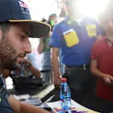Daniel Ricciardo (AUS) Red Bull Racing signs autographs for the fans at Formula One World Championship, Rd8, European Grand Prix, Preparations, Baku City Circuit, Baku, Azerbaijan, Thursday 16 June 2016. © Sutton Images