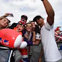 Lewis Hamilton (GBR) Mercedes AMG F1 poses for a selfie photograph with the fans at the autograph session at Formula One World Championship, Rd12, German Grand Prix, Qualifying, Hockenheim, Germany, Saturday 30 July 2016. © Sutton Images