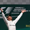 Race winner Lewis Hamilton (GBR) Mercedes AMG F1 celebrates with the trophy on the podium at Formula One World Championship, Rd12, German Grand Prix, Race, Hockenheim, Germany, Sunday 31 July 2016. © Sutton Images