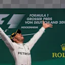 Race winner Lewis Hamilton (GBR) Mercedes AMG F1 celebrates on the podium with the trophy at Formula One World Championship, Rd12, German Grand Prix, Race, Hockenheim, Germany, Sunday 31 July 2016. © Sutton Images