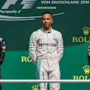 Daniel Ricciardo (AUS) Red Bull Racing, race winner Lewis Hamilton (GBR) Mercedes AMG F1 and Max Verstappen (NED) Red Bull Racing celebrate on the podium at Formula One World Championship, Rd12, German Grand Prix, Race, Hockenheim, Germany, Sunday 31 July 2016. © Sutton Images